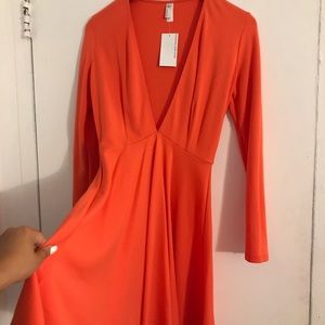 American Apparel Dresses - American apparel, sleeved deep V racer dress. NWT American Apparel Dresses - American apparel, sleeved deep V racer dress. NWT