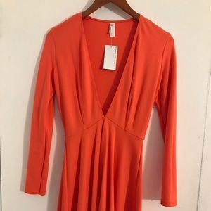 American Apparel Dresses - American apparel, sleeved deep V racer dress. NWT American Apparel Dresses - American apparel, sleeved deep V racer dress. NWT
