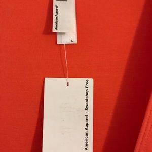 American Apparel Dresses - American apparel, sleeved deep V racer dress. NWT American Apparel Dresses - American apparel, sleeved deep V racer dress. NWT
