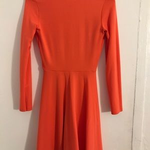 American Apparel Dresses - American apparel, sleeved deep V racer dress. NWT American Apparel Dresses - American apparel, sleeved deep V racer dress. NWT