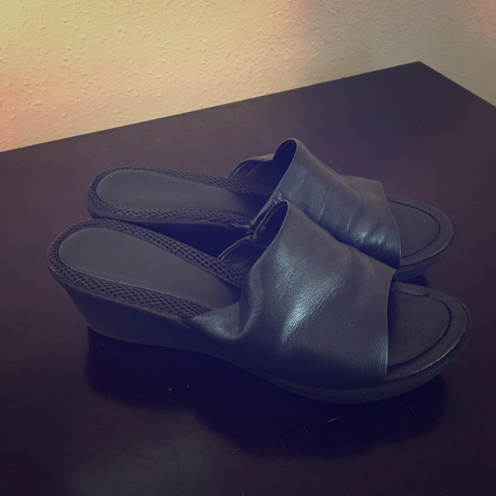 Black leather slides, size 8.5.