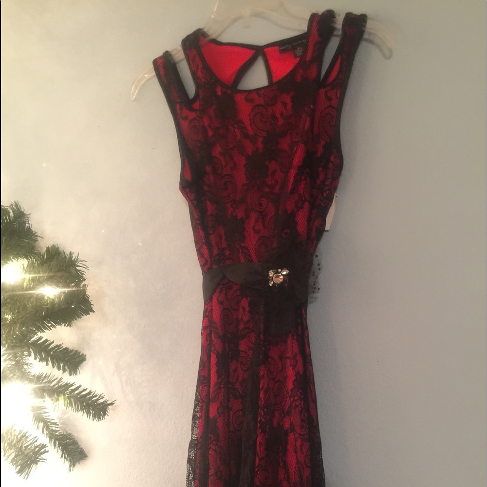 Brand new!  Never worn.  Red and black lace dress.