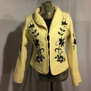 Embroidered cream and black wool blazer.