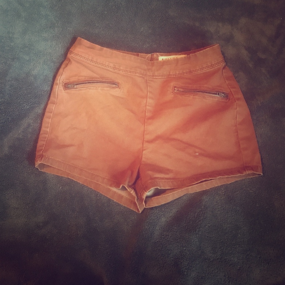 Brown shorts with zippers