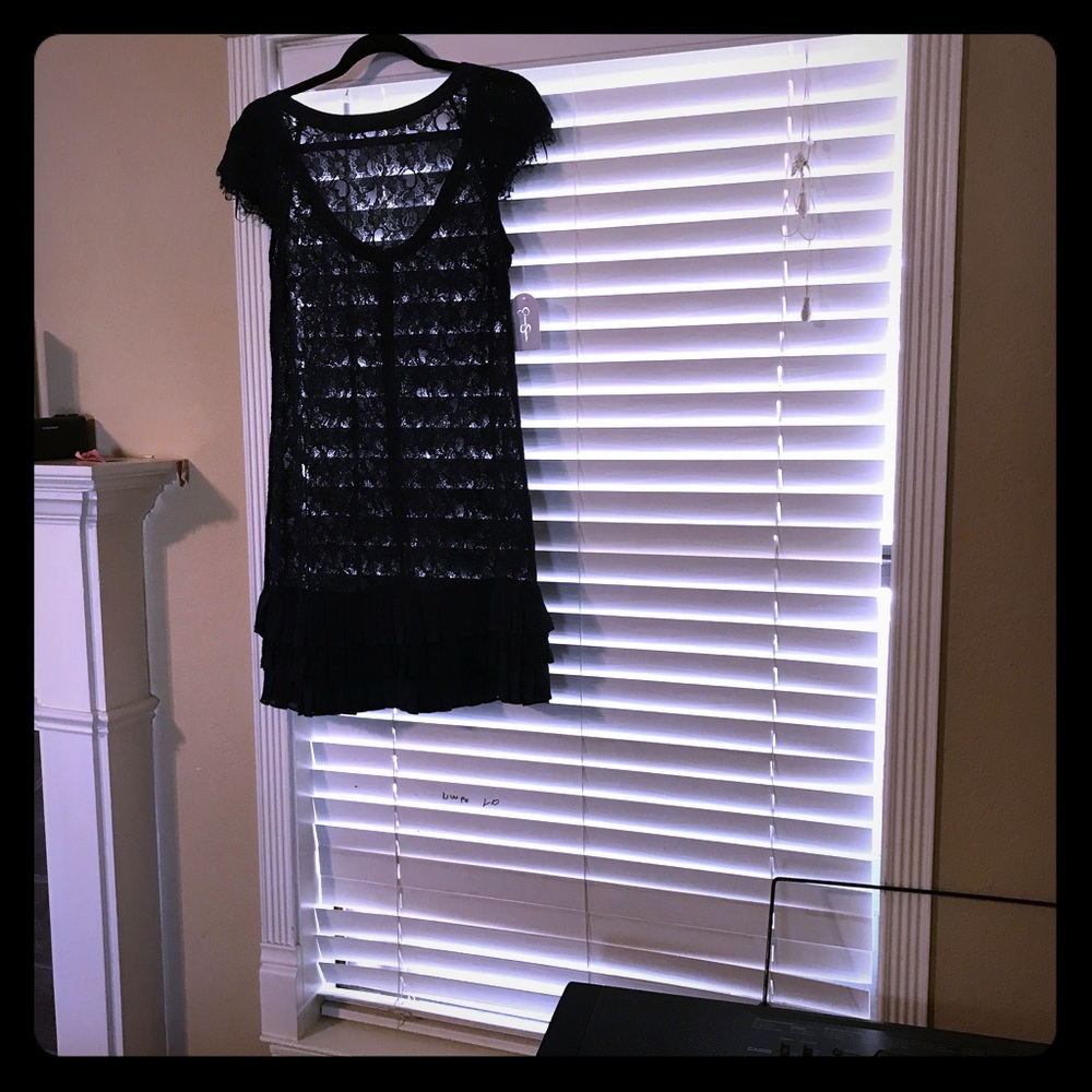 Lace dress, see through. Need a camisole if desire