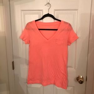 Peach V-neck.