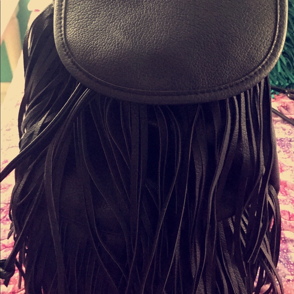 Black, fringe backpack.