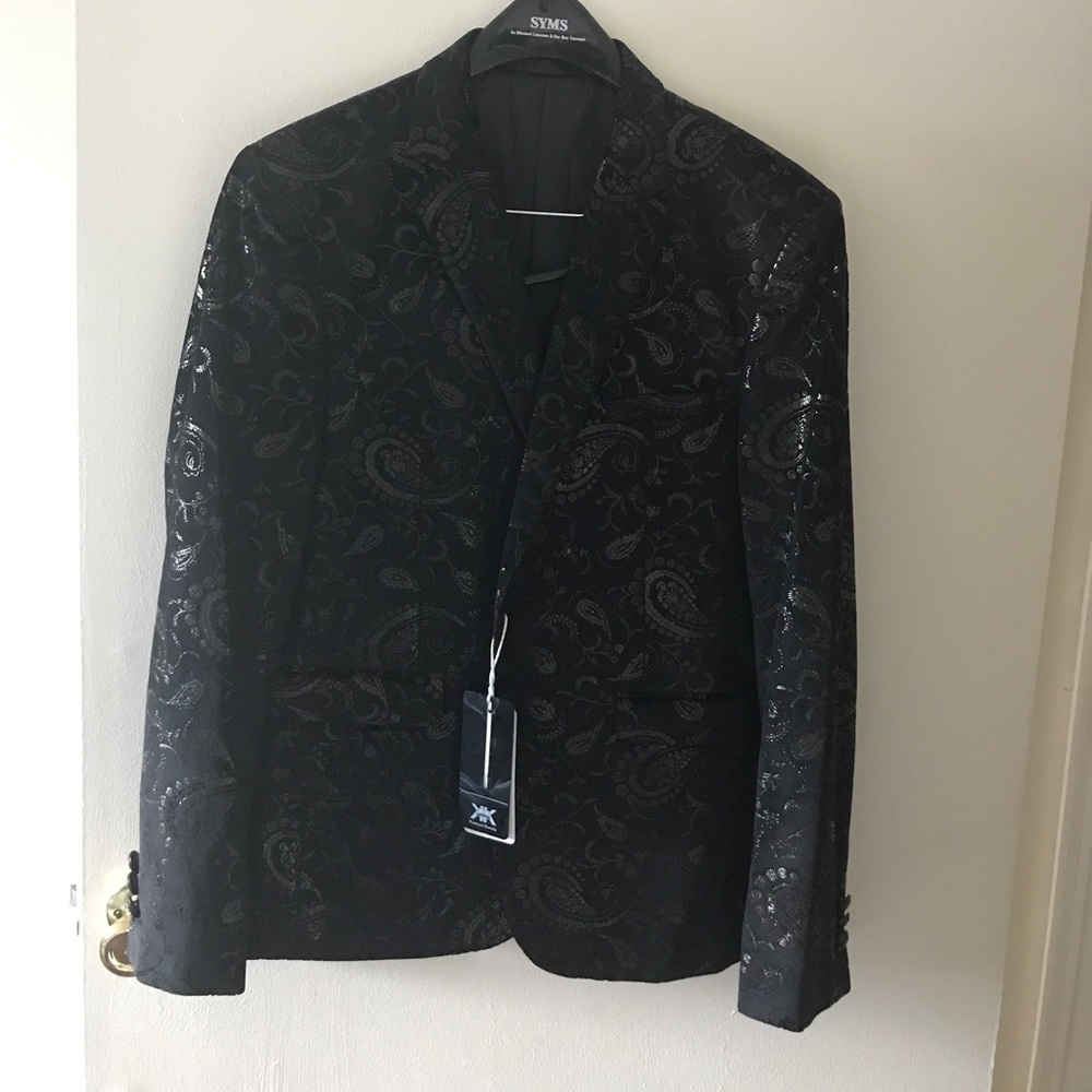 Black velvet jacket with golden design. Size S