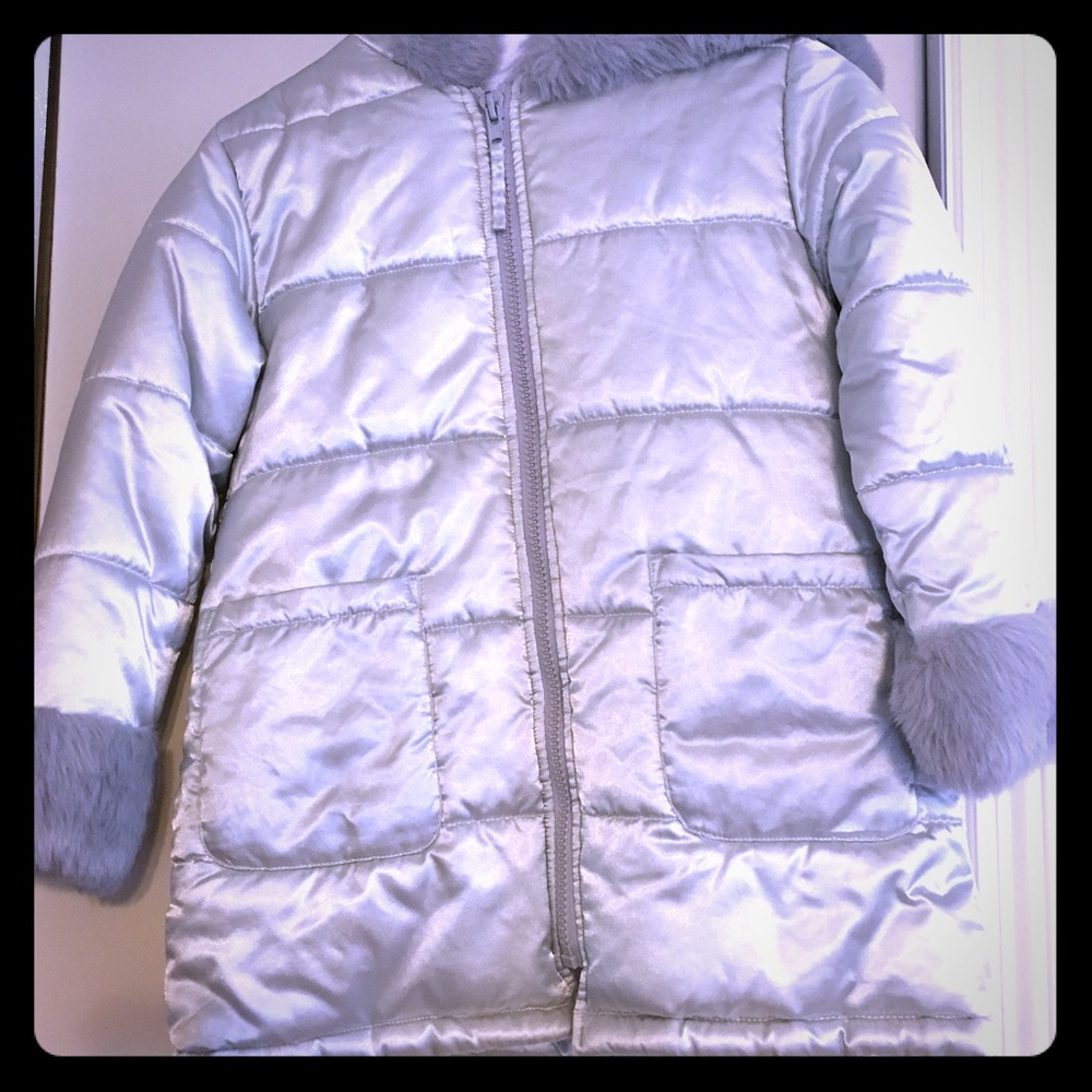 Girls' silver ski jacket, size 7/8.