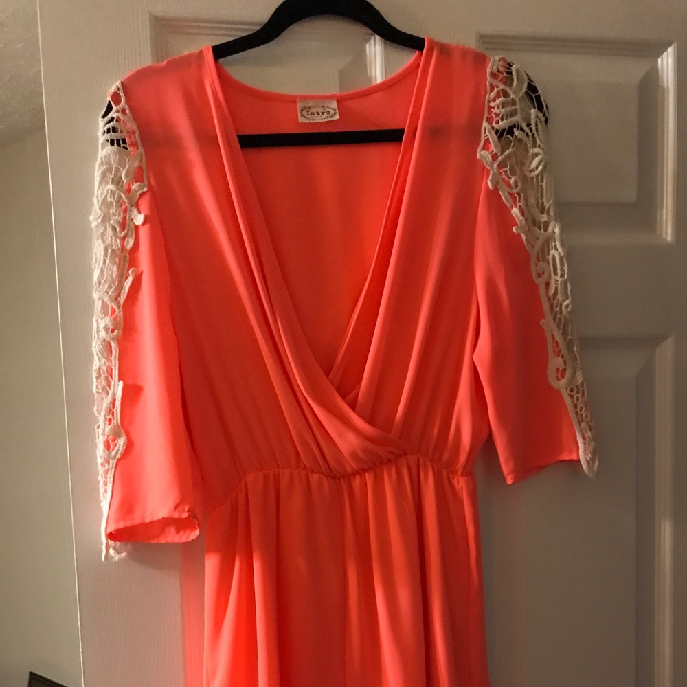 Light orange romper with lace sleeve detail