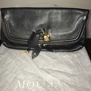 Alexander McQueen black clutch