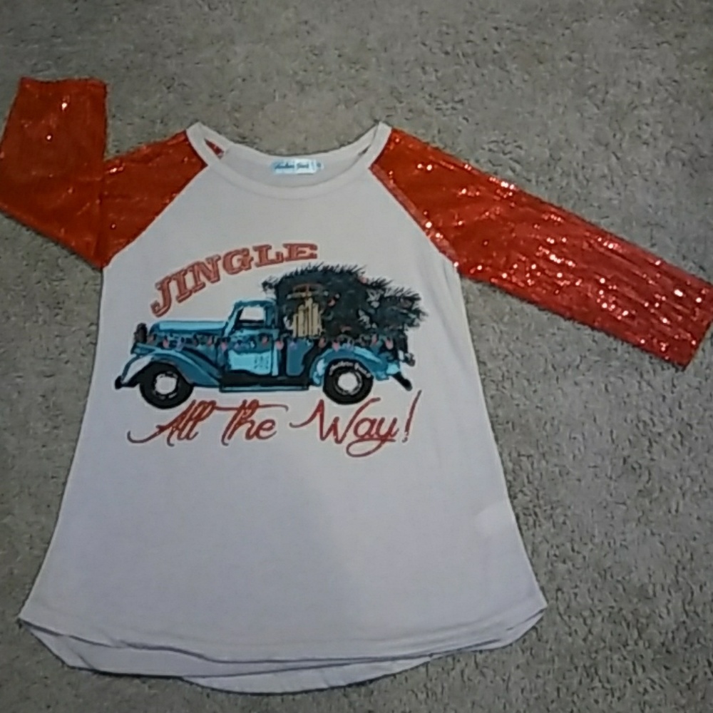 Nwot. X-mas shirt. Never worn too small.