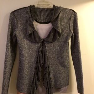 Two piece sweater with sleeveless top