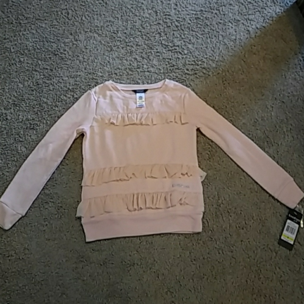 Girls long sleeve shirt. Super soft! Runs small.