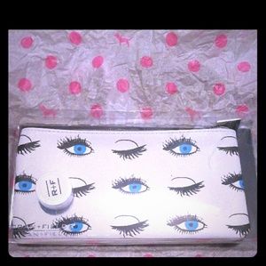 Rodan + Fields Makeup bag and mini Redefine