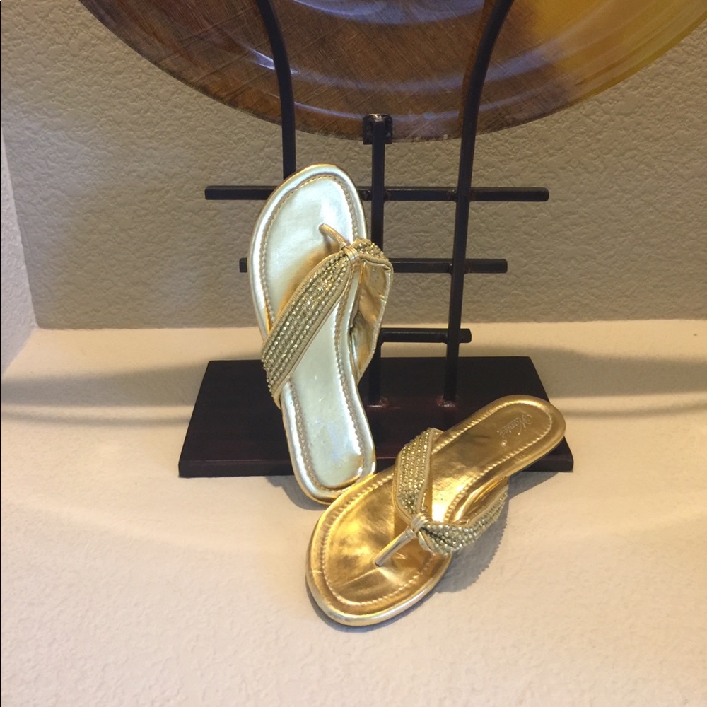 Gold sandals.