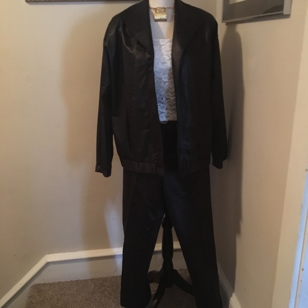 Two piece Black pant suit.