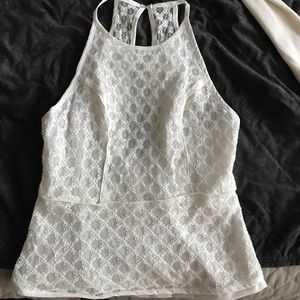 sleeveless delicate top with a lace overlay