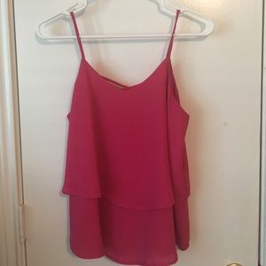 Pink flowy blouse with criss-cross back detail