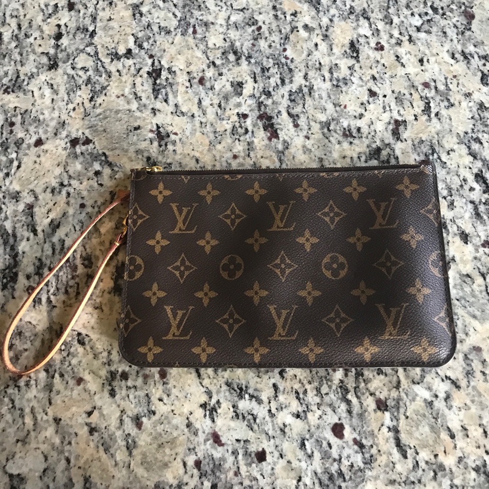 Authentic monogrammed Louis Vuitton wristlet