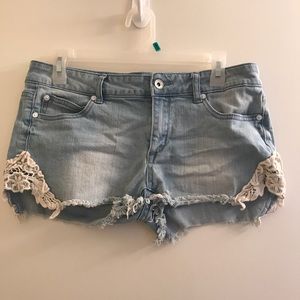 Jean shorts with lace on side