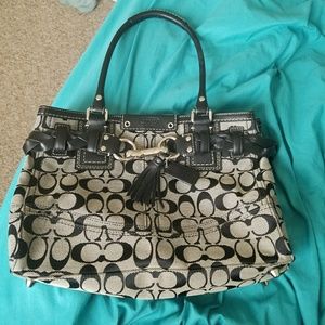 Black and gray medium size coach purse