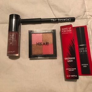 Makeup set! Lipgloss, pencil, mascara, and bronzer