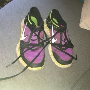 Nike purple and green track shoes size 8