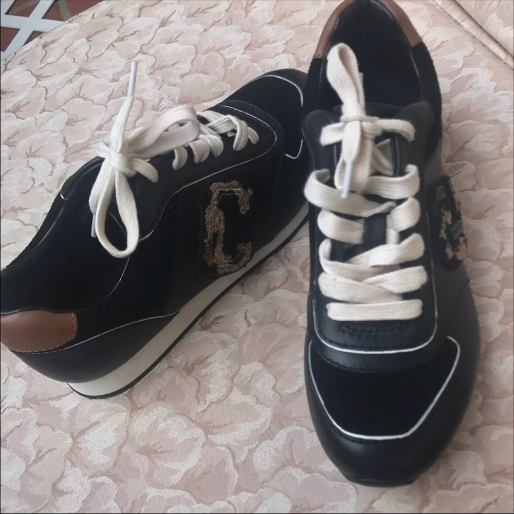 Black Coach leather sneakers