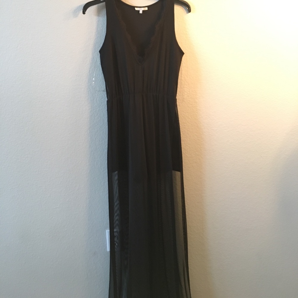 Black romper with sheer mesh overlay