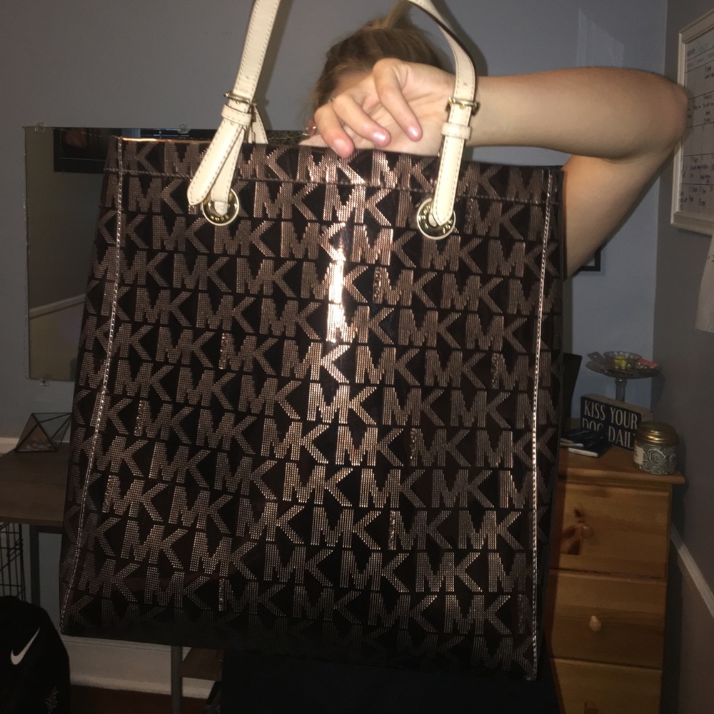 MK metallic brown purse