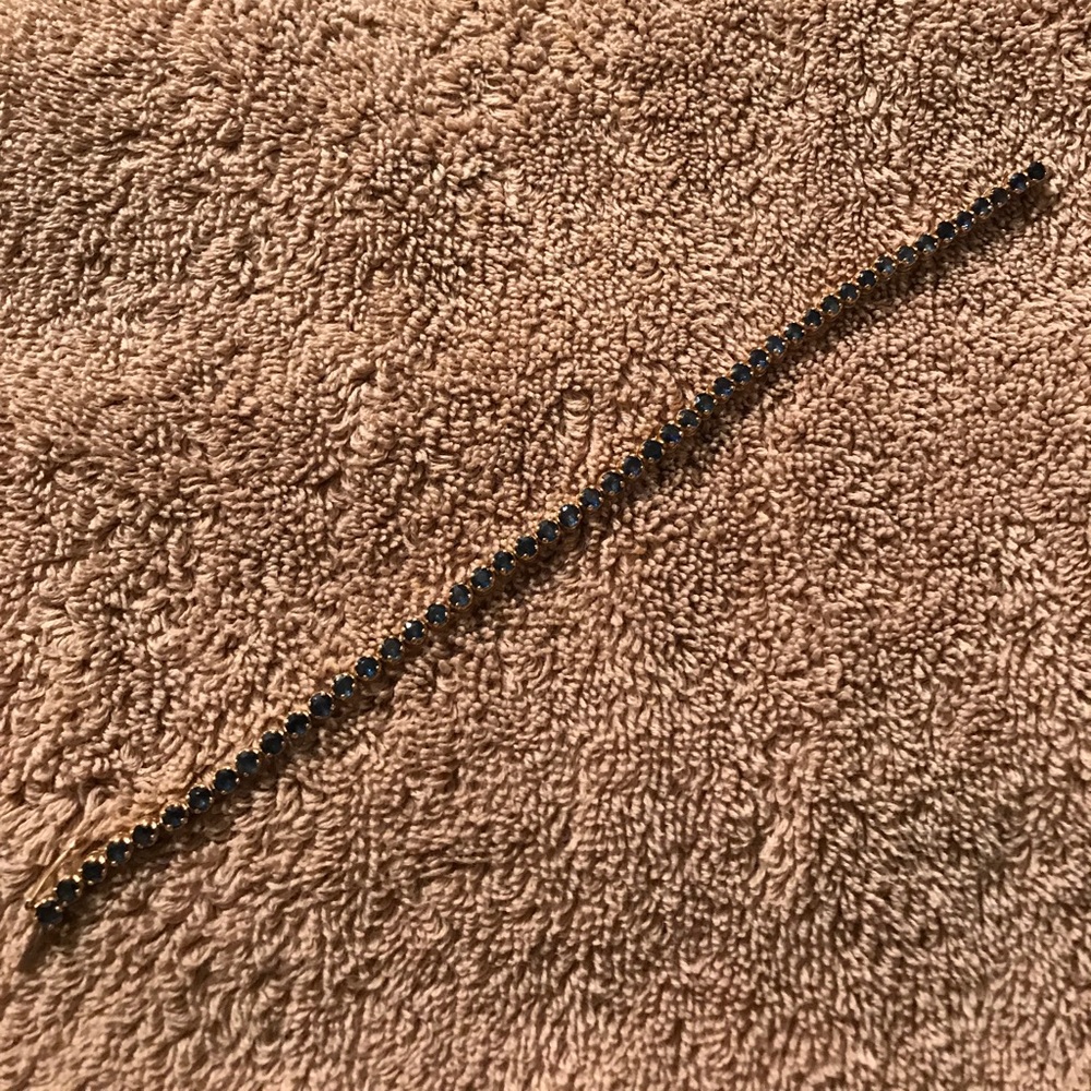 Blue sapphire yellow gold tennis bracelet