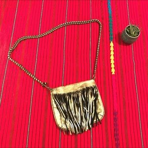 Gold leather bag with fringe