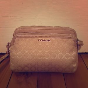 Coach wristlet New Without Tags - gold logo print