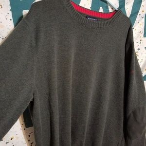 Lands End grey sweater with red trim around collar