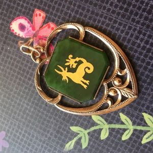 Bronze placed with gold pendant  Capricorn 🦄