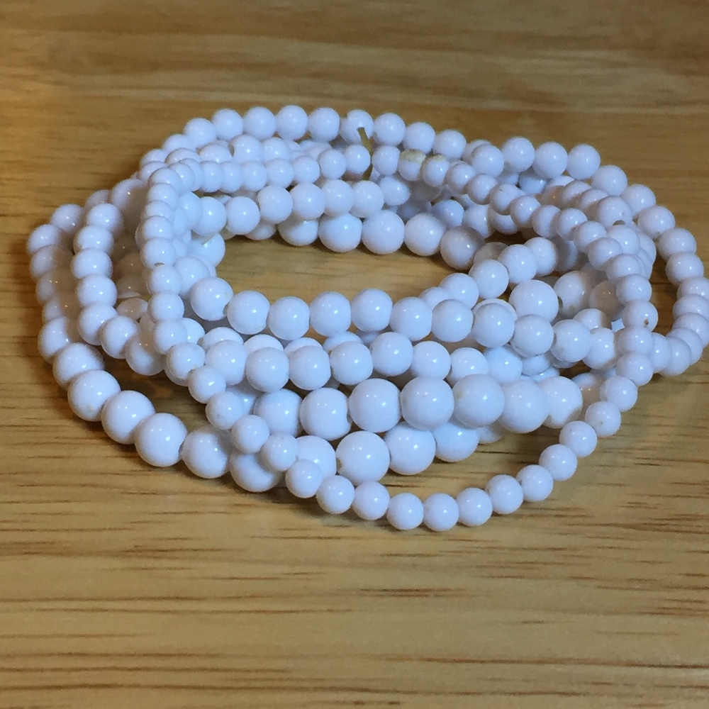 White Costume Bracelets