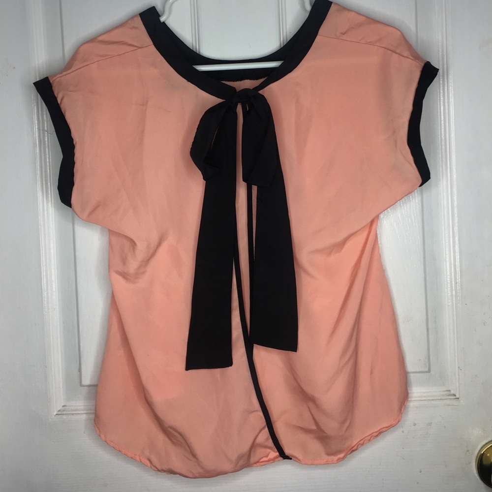 Salmon colored open back blouse