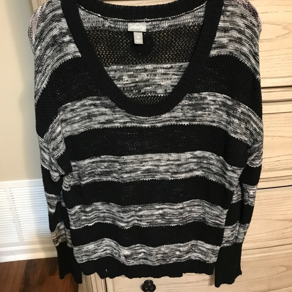 Black and gray sweater
