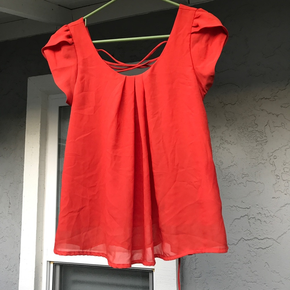 Flowy tulip sleeve blouse with lace up back