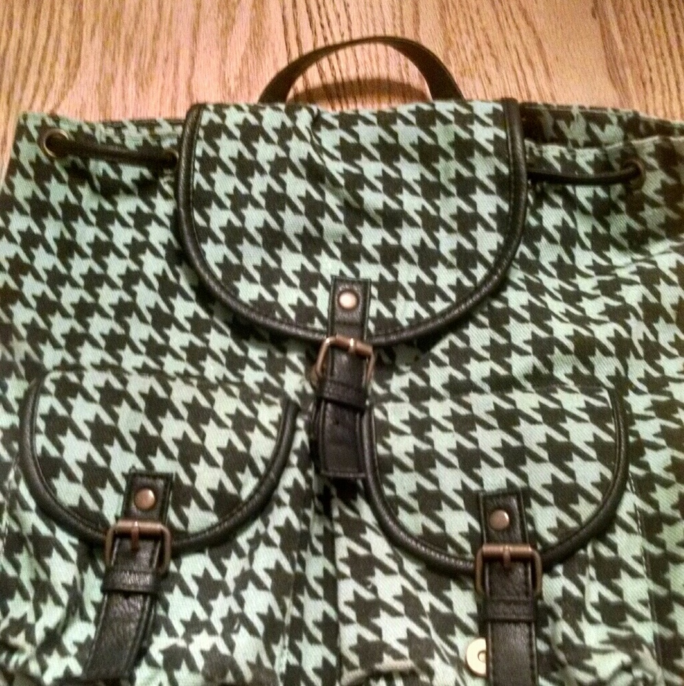 A nice dark green purse.