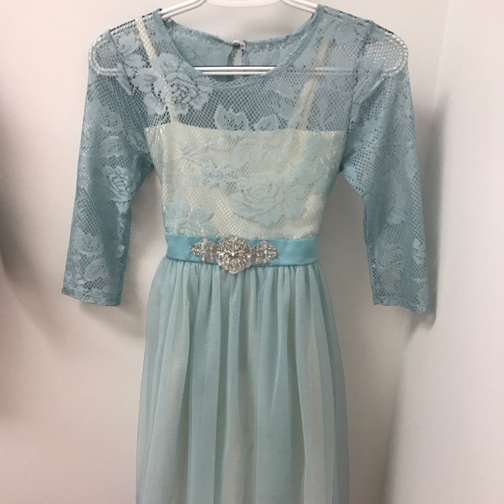 A light blue dress with rhinestone belt!