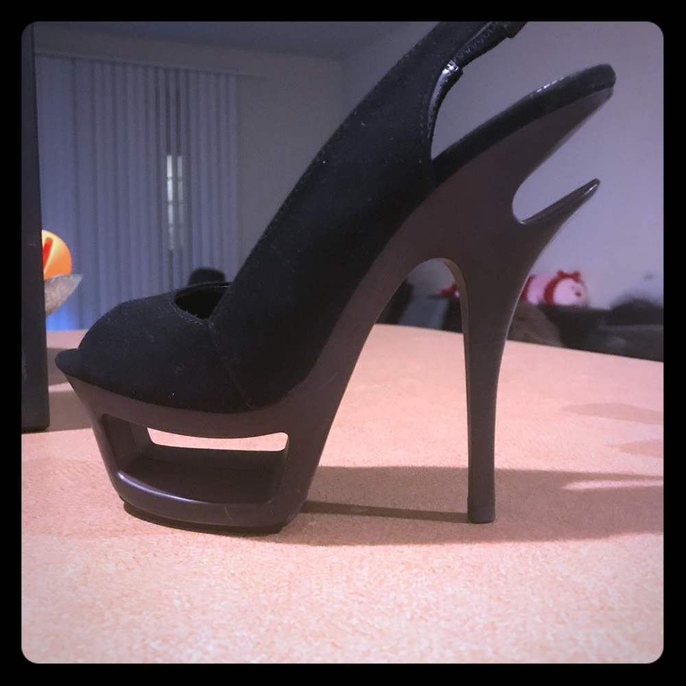 Pleaser brand high heels shoes with back strap.