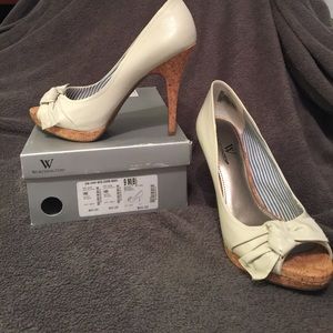 Worthington white open toe with cork heels.