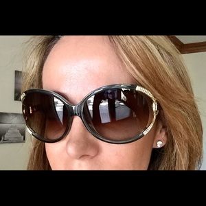 Ferragamo sunglasses.