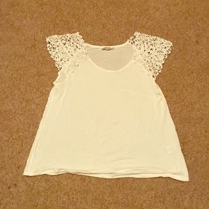 Off-white juniors blouse with lace sleeves
