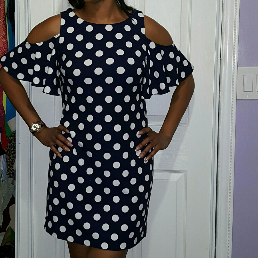 Summer dress easily convertible to a Fall piece.