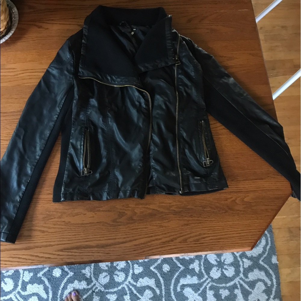 A Black asymmetrical zip jacket