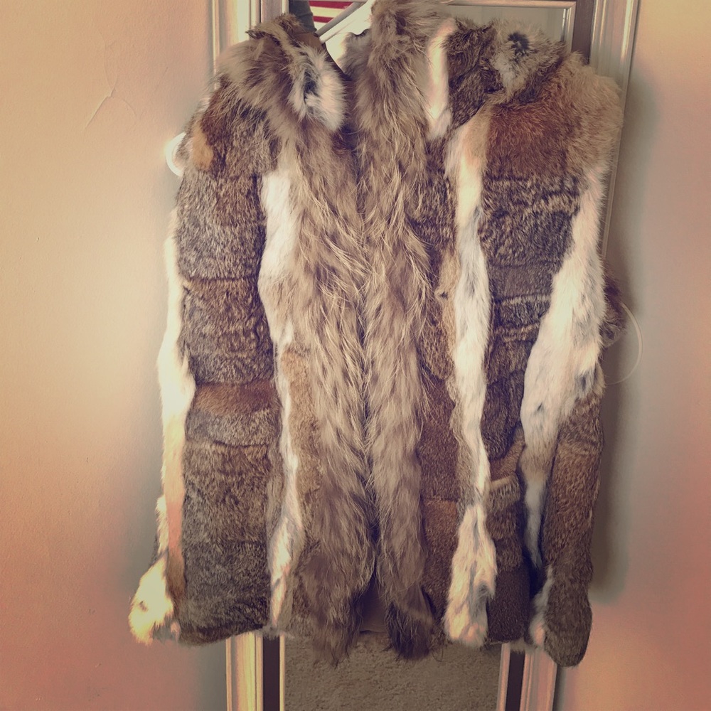 100% Real rabbit fur vest with hood.