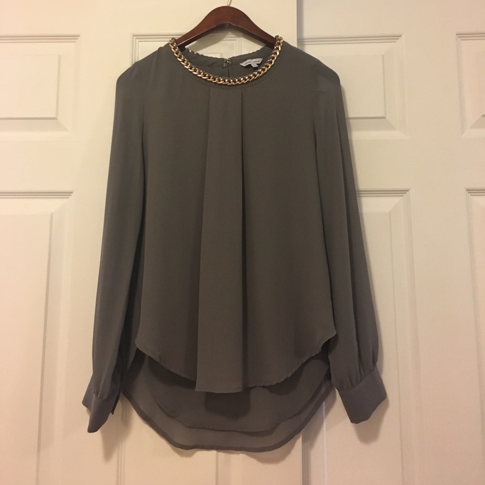 Gray polyester top with metal neck detail!